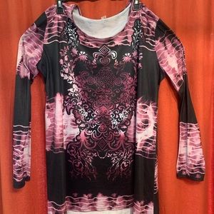 NWOT Beautiful woman’s top. Never worn.